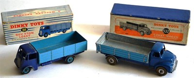 Lot 275 - Two Boxed Dinky Commercial Vehicles:- Guy 4-Ton Lorry No.511, with dark blue cab and chassis...