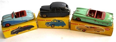 Lot 285 - Three Boxed Dinky Cars:- Packard Convertible No.132, with green body, red interior, tan driver;...