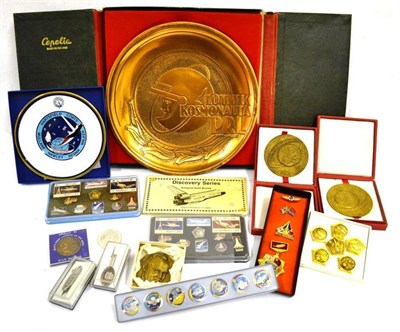 Lot 345 - Space Travel Memorabilia, including two albums of stamps, commemorative bronze medallions, Intelsat