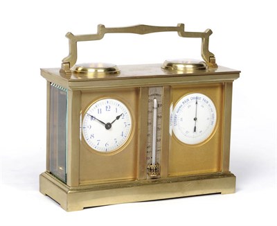 Lot 1285 - A Brass Compendium Carriage Clock, circa 1900, the case with a top carrying handle and visible...