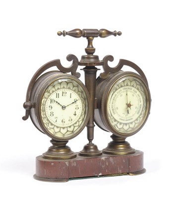 Lot 1287 - A Combined Aneroid Barometer Desk Timepiece, circa 1900, the brass mounted case with carrying...