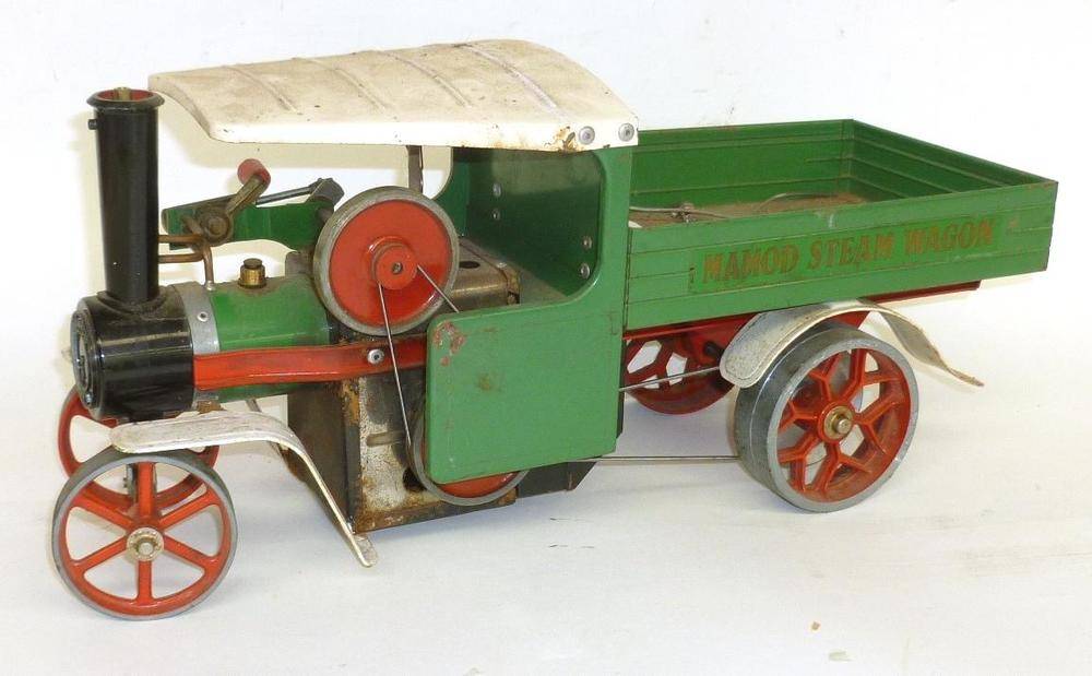 Lot 41 - A Mamod Steam Wagon, with green and white body, red spoked wheels, steering rod and fuel tablets