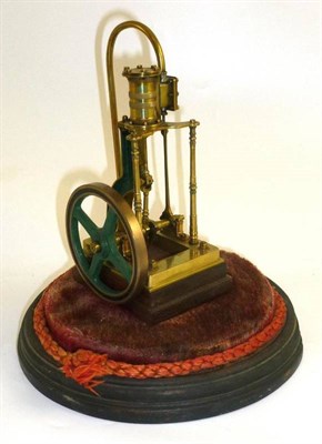 Lot 47 - A Small Brass Live Steam Model of a Single Cylinder Upright Engine, with finely turned pillars,...