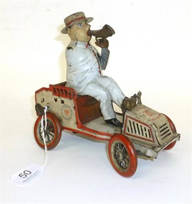 Lot 50 - A Lehmann Clockwork Tinplate Tut Tut Toy No.490, in the form of a man in a car blowing a horn, last