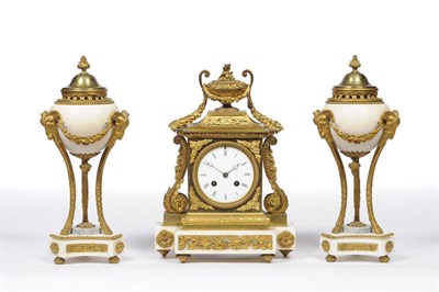 Lot 1298 - A French Ormolu and White Marble Striking Mantel Clock with Garniture, circa 1880, the case...