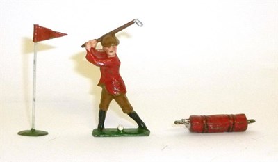 Lot 150 - A Pre-War Hillco Lead Golfer with Flag and Bag, the golfer with red jacket