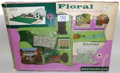 Lot 152 - A Boxed Britains Plastic Floral Miniature Garden Set No.7538, with greenhouse and cold frame,...