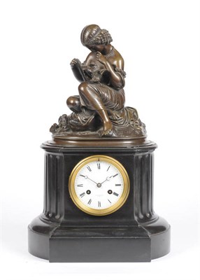 Lot 1299 - A French Black Slate and Bronze Striking Mantel Clock, retailed by  F L Hausburg, A Paris,...