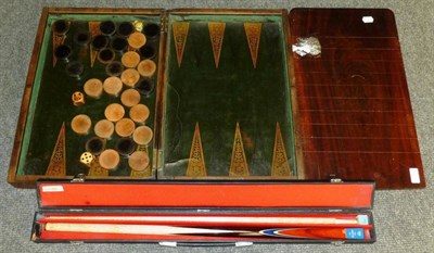 Lot 162 - A 19th Century Folding Mahogany Draughts and Backgammon Board, containing boxwood and ebony playing