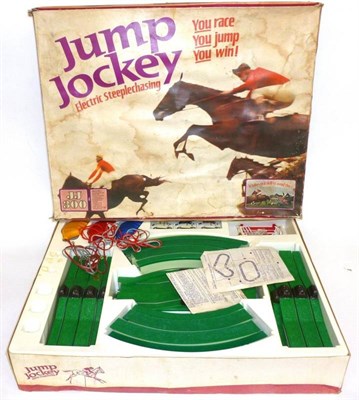 Lot 163 - Two Boxed Horse Racing Sets - Tri-ang Jump Jockey and Merit Derby Racing Game