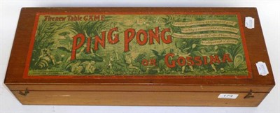 Lot 174 - A Jaques Ping Pong or Gossima Set, in wooden box with pictorial label, retailed by Hamleys,...