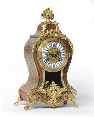 Lot 1302 - A 'Boulle' Striking Mantel Clock, circa 1890, the elaborate case with gilt metal mounts and...