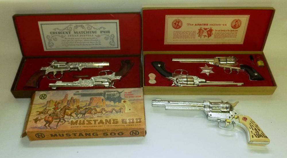 Lot 186 - Three Boxed Cowboy Gun Sets - The Apache Calibre .44 Outlaw Guns by B.C.M. Company, Crescent...