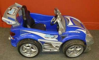 Lot 187 - Two Large Electrically Operated Plastic Toy Pedal Cars - Wave Razor and Volcano Tornado,...