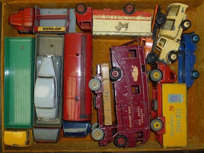 Lot 211 - Twelve Playworn Dinky Vehicles, including Leyland and Foden wagons, Heinz Big Bedford van, Guy...