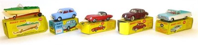 Lot 216 - Four Boxed Dinky Vehicles - Jaguar E-Type No.120, with red body, black plastic roof, Jaguar 3.4...