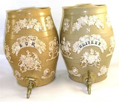 Lot 229 - A Pair of 19th Century Stoneware Spirit Barrels - Whisky and Rum, with moulded and applied...