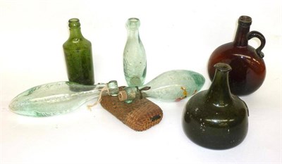 Lot 239 - An 18th Century Sealed Mallet Shaped Green Glass Wine Bottle, seal is a 'B over T.M' (star cracks)