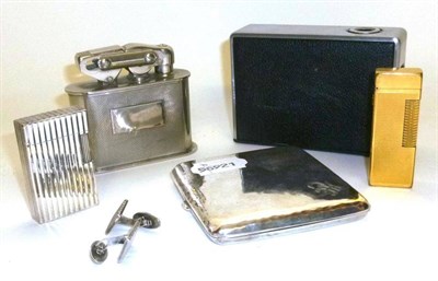 Lot 247 - Four Cigarette Lighters, comprising a Dupont M0245 pocket lighter with matching cufflinks,...