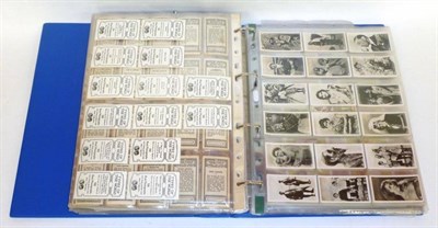 Lot 255 - An Album of American and Canadian Cigarette Cards, including American Tobacco company, B.A.T.,...