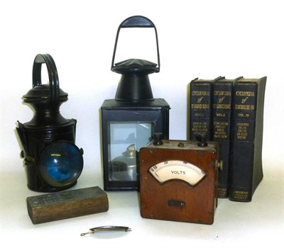 Lot 276 - Railway Memorabilia, comprising two tinplate hand lamps - one stamped 'BR(M)', LNER volt meter, G.N