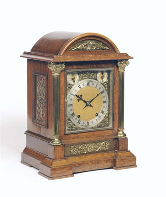 Lot 1312 - An Oak Quarter Chiming Table Clock, circa 1890, the arched case with side opening doors, Corinthian