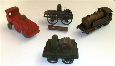 Lot 13 - Four Model Trains, comprising a Bowman 'O' gauge live steam 0-4-0 tank engine, metal locomotive...