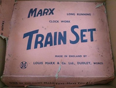 Lot 16 - A Boxed Marx Clockwork 'O' Gauge Passenger Train Set E25, containing locomotive, tender, two...