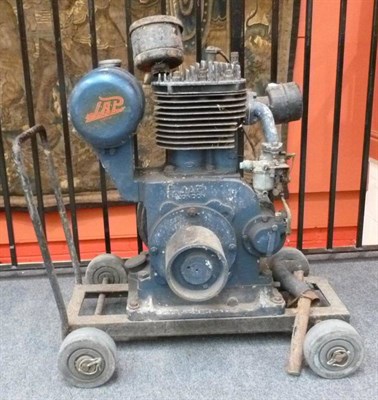 Lot 42 - A Single Cylinder Belt Driven Stationary Engine with Crank Start by Jap, painted blue, mounted...