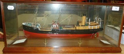 Lot 58 - A Scratch Built Wooden Model of the Cargo Ship S.S. Fairfield, with red and black painted hull,...