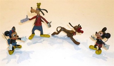 Lot 89 - Four Lead Walt Disney Figures by Sacul - Mickey Mouse, Minnie Mouse, Pluto and Goofy