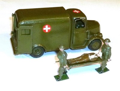 Lot 106 - Britains Post War Lead Ambulance, with white cross, driver, two stretcher bearers, stretcher...