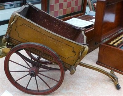 Lot 125 - An Early Hand Painted Wooden Cart, the spoked wheels with iron rims, with drop down front and...