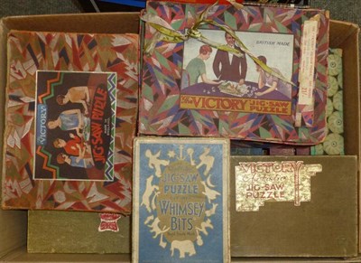 Lot 127 - A Large Collection of Vintage Jigsaw Puzzles, both cardboard puzzles and wooden puzzles,...