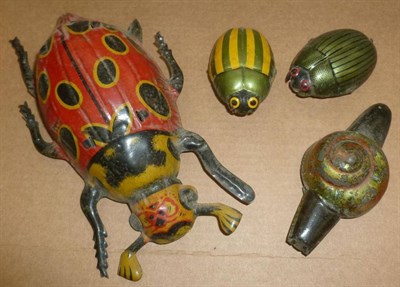 Lot 157 - A Collection of Small Toys, including four tinplate insects, toy guns, tinplate and wooden...