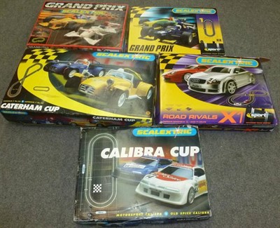 Lot 166 - Five Boxed Scalextric Slot Car Racing Sets - Grand Prix1, Road Rivals X1, Calibra Cup C1045,...