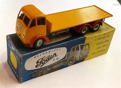 Lot 174 - A Boxed Shackleton Mechanical Foden FG Flat Back Wagon, with yellow cab and back, red hubs,...