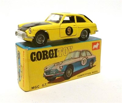 Lot 191 - A Boxed Corgi MGC G.T. Competition Model No.345, with yellow body, black bonnet, tailgate, interior