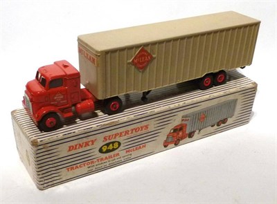 Lot 213 - A Boxed Dinky Supertoys Mclean Tractor-Trailer No.948, with red cab and hubs, plastic trailer, in a