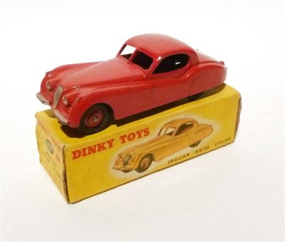 Lot 217 - A Boxed Dinky Jaguar XK120 Coupe No.157, with red body and hubs