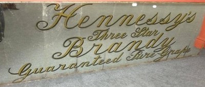 Lot 224 - A Large 'Hennessy's Three Star Brandy - Guaranteed Pure Grape'  Advertising Mirror, with gilt...