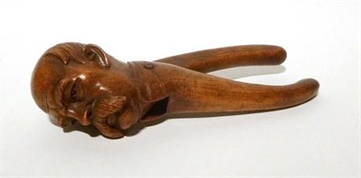 Lot 255 - A Carved Treen Nutcracker in the Form of Boer War General Lord or Earl Roberts, length 18cm