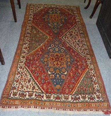 Lot 1337 - A Kashgai Rug South West Persia The field with twin stepped medallions containing boteh and...