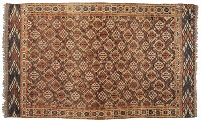 Lot 1339 - A Chodor Carpet Emirate of Bokhara The chocolate field with columns of linked stepped guls enclosed