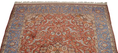 Lot 1340 - Isfahan Carpet  Central Persia The soft madder field of scrolling vines around a massive...