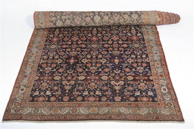 Lot 1341 - Hamadan Khelleh Persian Kurdistan The deep indigo Herati field enclosed by leaf and rosette borders