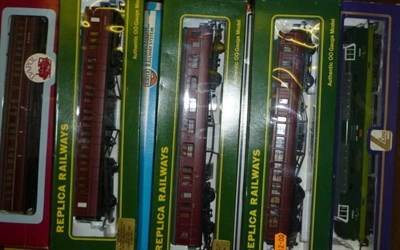 Lot 1030 - A Collection of Boxed 'OO' Gauge Trains, including three Lima locomotives and three coaches,...