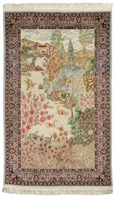 Lot 1345 - A Pictorial Isfahan Rug Central Iran The cream field depicting a garden scene with birds and...