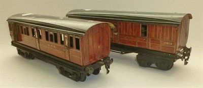 Lot 1052 - Two Marklin Gauge 1 Bogie Coaches, numbered 2873 and 2874, in GNR wood effect livery, with grey...