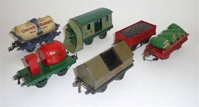 Lot 1058 - Six Hornby 'O' Gauge Wagons - United Dairies Milk Tank Wagon, boxed Single Wine Wagon, boxed Barrel